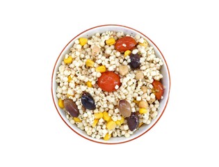 Fregola with vegetables in a ceramic bowl on white background. It is an italian pasta from Sardinia island, also called Fregula, similar to couscous.