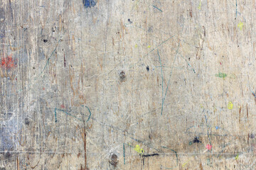 Unusual beautiful abstract brown wooden background with traces of paint