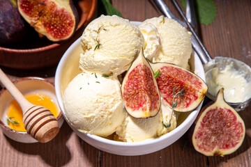 Tasty fig gelato ice cream, aromatic and creamy fruit sorbet dessert with autumn spicy flavour, in...