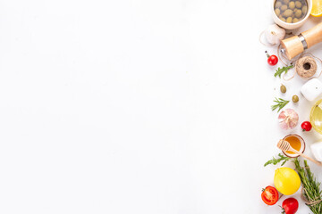 Cooking food background, preparation dinner, lunch flat lay white table with fresh ingredients, spices, condiments - lemon, parsley, garlic, olive oil, salt and pepper, copy space