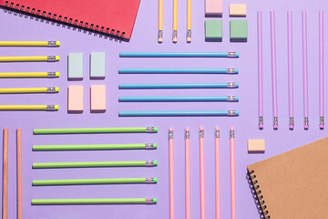 Colorful school supplies arranged in flat lay