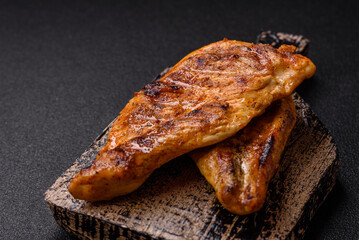 Delicious fresh grilled chicken fillet with spices and herbs
