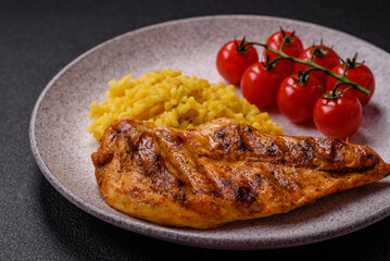 Delicious fresh grilled chicken fillet with spices and herbs