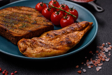 Delicious fresh grilled chicken fillet with spices and herbs