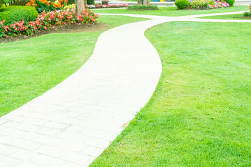Walkway pathway s curve in public park,Lawn with curved paved garden path,Garden landscape design...
