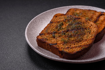 Delicious crispy croutons or bruschetta from brown bread