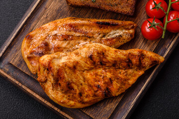 Delicious fresh grilled chicken fillet with spices and herbs