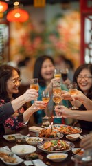 Friends cheerfully toast with glasses while enjoying a meal in a lively restaurant setting
