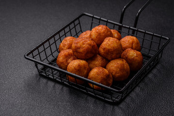 Delicious crispy balls breaded with mozzarella cheese, salt and spices