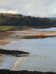 Beach at Sunset in a Coastal Town