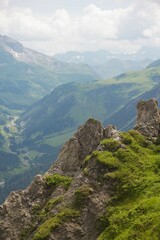 Stunning jagged rocky alpine outcropping over valley