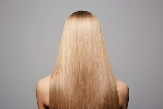 beautiful blond hair woman. Back of girl with Healthy hair