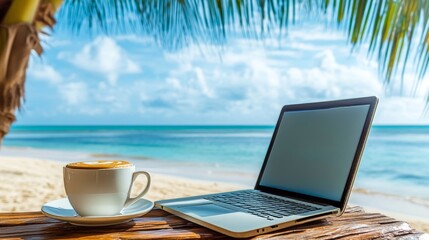 laptop and coffee cup against the backdrop of the ocean. Work-life balance concept