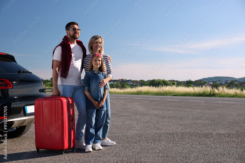 Sticker Happy family with red suitcase near car outdoors, space for text