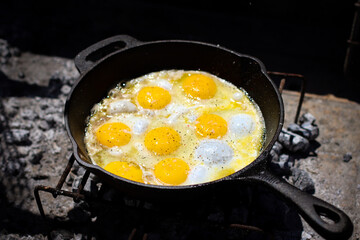 Eggs cooked over the fire