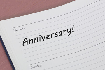 Obraz premium Anniversary reminder note in diary page