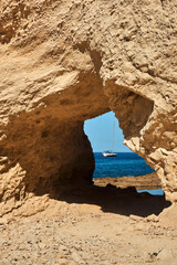 Through passage in the rock near the sea