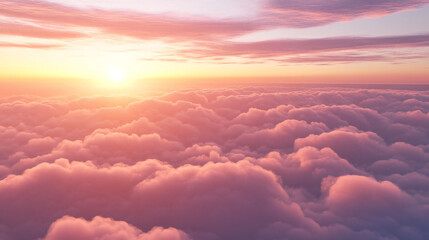 Beautiful sunset sky with pink fluffy clouds view from above