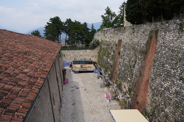 Fototapeta premium Brescia, Italy - June 17, 2024 - the view of the Brescia castle on a sunny spring afternoon