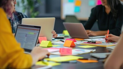 Collaborative Team Brainstorming Session in Modern Office Space With Colorful Sticky Notes