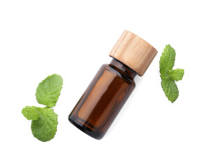 Bottle of essential oil and mint isolated on white, top view