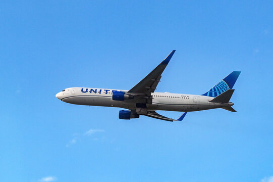 London, England, UK - 28 April 2024: Boeing 767 (registration N649UA) operated by United Airlines climbing after take off from London Heathrow airport.