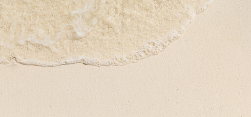 Tropical Beach Panorama, Sea Waves, White Sand, and Foam - Ideal for Travel and Vacation Backgrounds