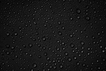 Water drops on black surface
