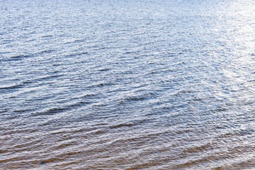 the surface of the water with waves