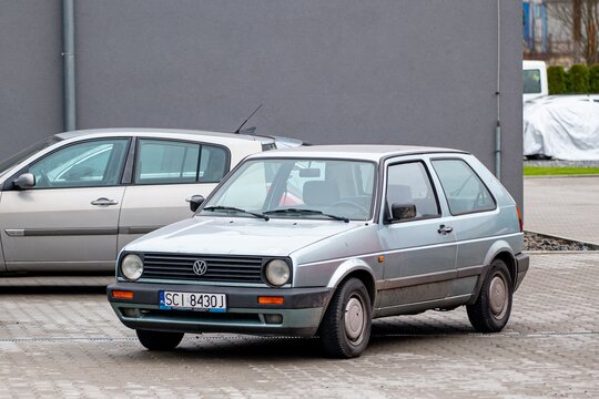 Silver Volkswagen Golf Mk2 old 3-door car parked