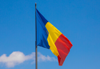 The Romanian flag fluttering in the wind