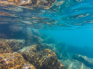 Underwater photo. Mediterranean Sea off the coast of Nice in southern France, seabed and rocks.