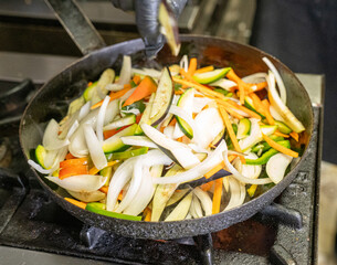 cook putting the preparations for a lunch to cook
