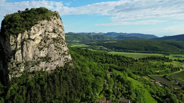 Panoramic mountain view near the village of Saou in the Drome department in France of the Vercors hills, the marly hills and the Val de Drome valley. The Saou forest and the 3 peaks - Drome Valley