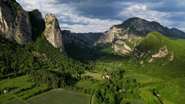 Panoramic mountain view near the village of Saou in the Drome department in France of the Vercors hills, the marly hills and the Val de Drome valley. The Saou forest and the 3 peaks. Timelapse shot