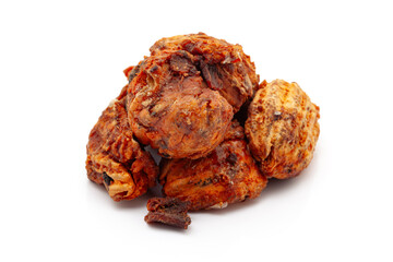 Close-up of Dry Organic Stone Apple or Bel (Aegle marmelos) fruit, isolated on a white background. Front view.