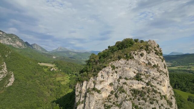 Panoramic mountain view near the village of Saou in the Drome department in France of the Vercors hills, the marly hills and the Val de Drome valley. The Saou forest and the 3 peaks - Drome Valley