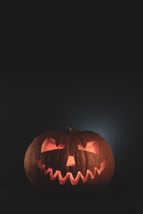 halloween jack o lantern on a dark background vertically for instagram stories