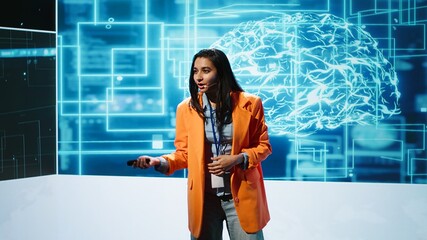 Upbeat presenters speak at AI forum gathering tech startups managers, investors and academics. IT...