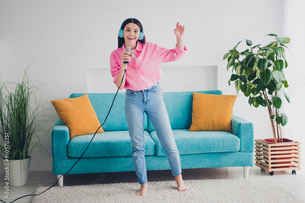 Poster Photo of adorable cute lady wear pink shirt earphones singing microphone listening songs staying home indoors room home house