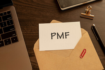 There is word card with the word PMF. It is an abbreviation for Product Market Fit as eye-catching...