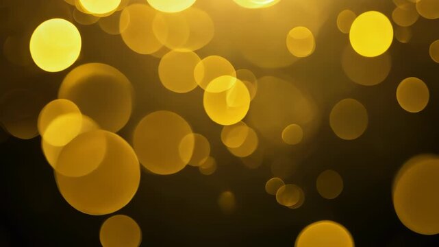 Close-up: Luminous golden orbs float ethereally against deep darkness. Static camera captures magical atmosphere. Soft focus creates dreamy, festive ambiance.	