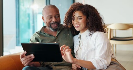 Home, couple and digital tablet for research, planning and decision for vacation destination. Married people, man and woman with tech for resort selection, schedule trip and choice on sofa in house