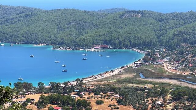 Akb&uuml;k Beach, one of the most beautiful beaches in Milas, Muğla, Turkey. Touristic places of gulf of G&ouml;kova. High angle view. Idyllic beauty background
