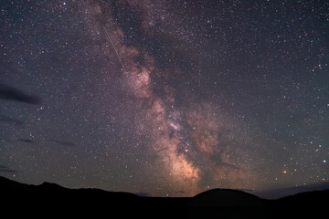 milky way sky stars mountains night