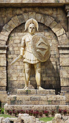 Warrior rome greek. Warrior wearing iron helmet and warrior old metal shield. Ancient warrior isolated