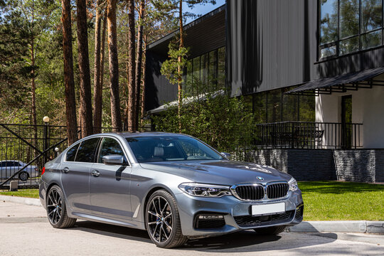 Novosibirsk, Russia -  July 10, 2024: BMW 5-series, parked in city ,   front view