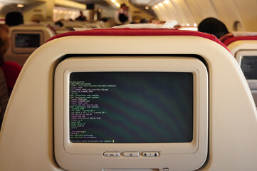 Airplane seat with Linux terminal on in-flight entertainment screen