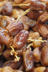  many date fruits display for sale at local market 