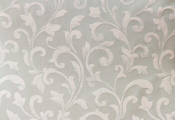 ペールグリーンの唐草模様の布・テクスチャ